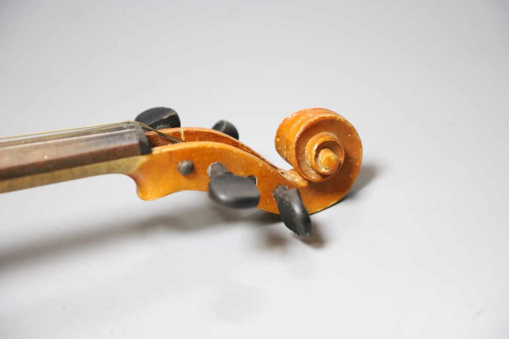 An early 20th century Czechoslovakian 3/4 size violin, bears fake Stradivarius label, cased